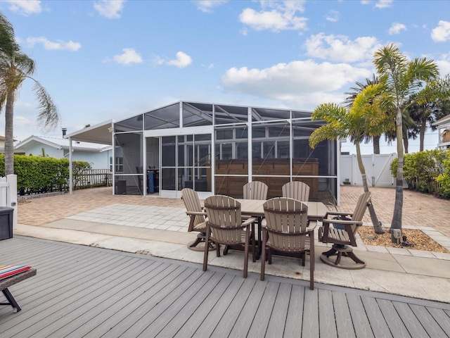 6531 Seaview Blvd, Hudson, FL 34667 - deck featuring a patio, a gate, a lanai, and outdoor dining area