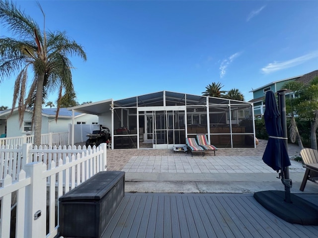 6531 Seaview Blvd, Hudson, FL 34667 - deck featuring a patio and glass enclosure