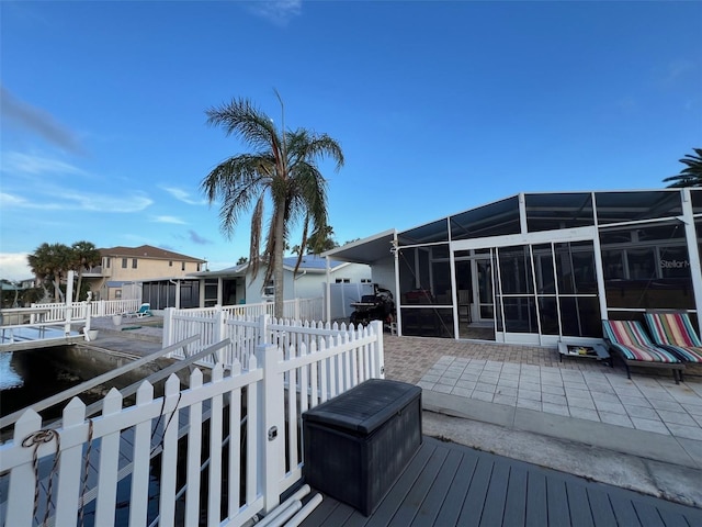6531 Seaview Blvd, Hudson, FL 34667 - deck featuring glass enclosure and a patio area