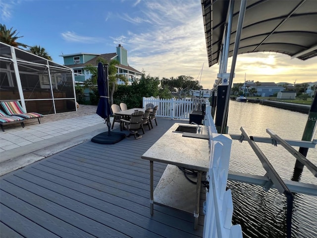 6531 Seaview Blvd, Hudson, FL 34667 - deck featuring outdoor dining area, a water view, and a patio