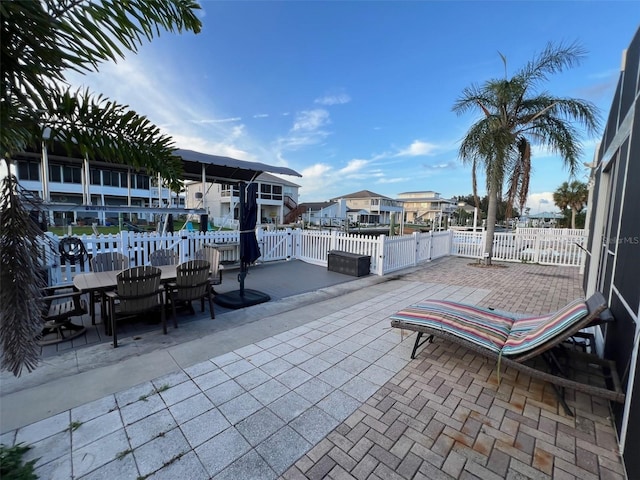 6531 Seaview Blvd, Hudson, FL 34667 - view of patio featuring a residential view and outdoor dining area