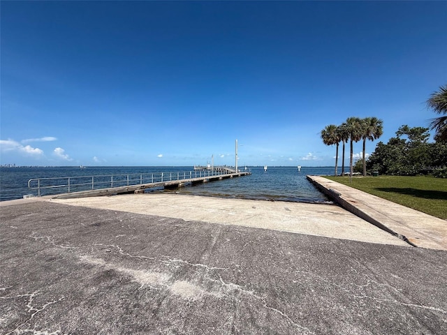 dock featuring a boat ramp and a water view