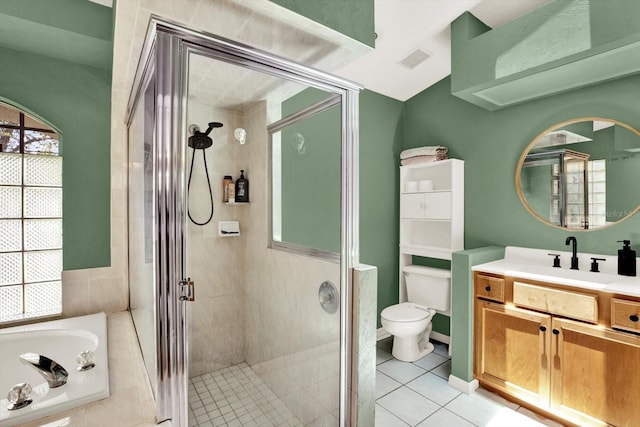 2454 Shadecrest Rd, Land O Lakes, FL 34639 - full bathroom featuring a shower stall, vanity, tile patterned flooring, and a garden tub