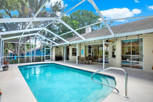 2454 Shadecrest Rd, Land O Lakes, FL 34639 - swimming pool with ceiling fan, a patio, and a lanai