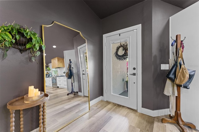 1313 W Carissa Ct, Tampa, FL 33604 - foyer featuring light wood-style floors and baseboards