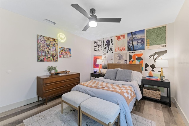 1313 W Carissa Ct, Tampa, FL 33604 - bedroom featuring wood finished floors and a ceiling fan