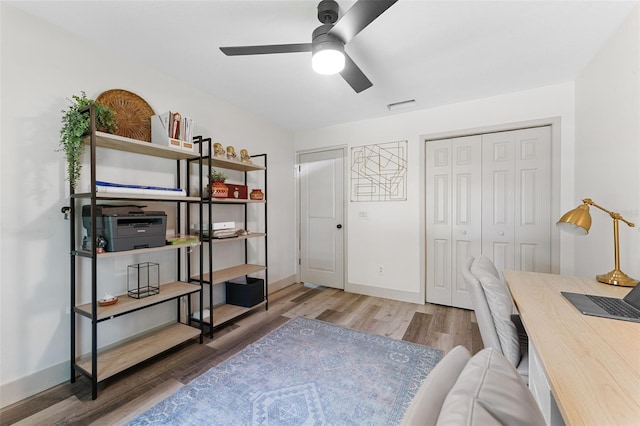 1313 W Carissa Ct, Tampa, FL 33604 - office area with wood finished floors and ceiling fan