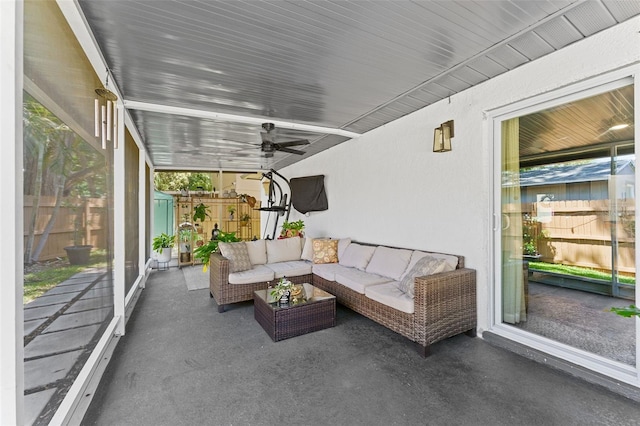 1313 W Carissa Ct, Tampa, FL 33604 - sunroom featuring ceiling fan and an outdoor living space