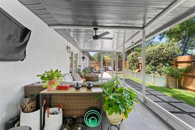 1313 W Carissa Ct, Tampa, FL 33604 - fenced backyard with ceiling fan and a patio