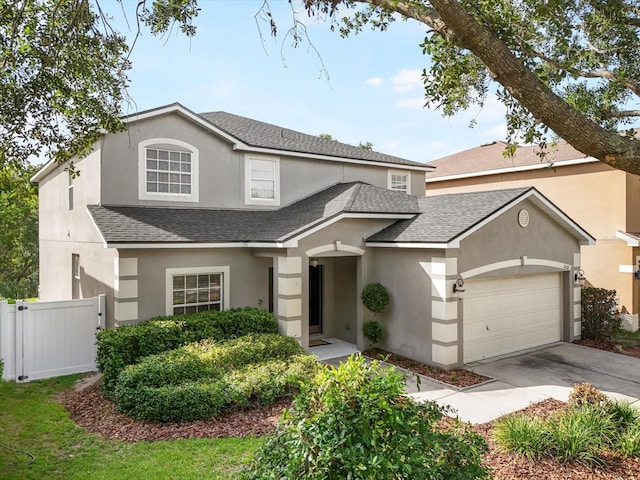 11132 Creek Haven Dr, Riverview, FL 33569 - traditional-style home with a shingled roof, a garage, stucco siding, and concrete driveway