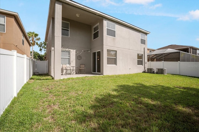 11132 Creek Haven Dr, Riverview, FL 33569 - back of house featuring stucco siding, a patio, and a fenced backyard