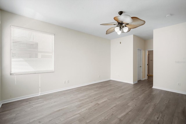 11132 Creek Haven Dr, Riverview, FL 33569 - empty room with a ceiling fan, wood finished floors, and a smoke detector