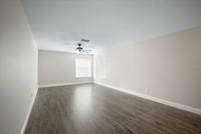 11132 Creek Haven Dr, Riverview, FL 33569 - spare room with dark wood-style flooring and a ceiling fan