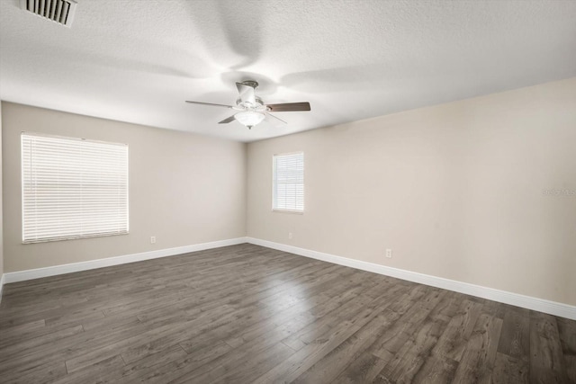 11132 Creek Haven Dr, Riverview, FL 33569 - unfurnished room featuring ceiling fan, dark wood-style floors, and a textured ceiling
