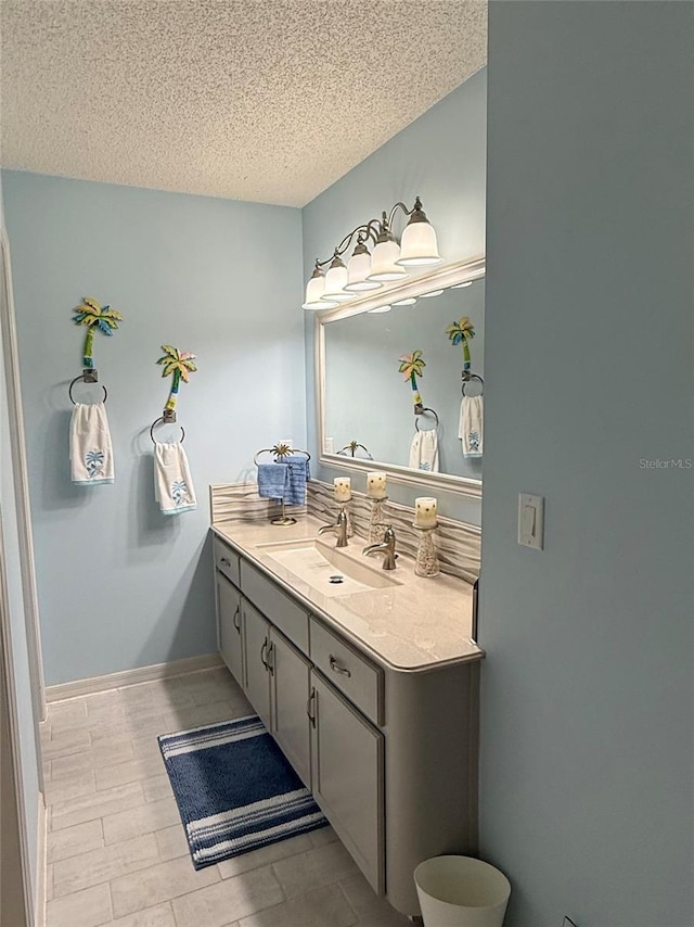 17569 SE 107th Ct, Summerfield, FL 34491 - bathroom with vanity and a textured ceiling