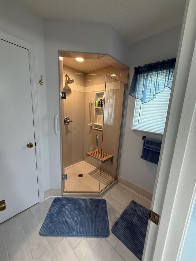 17569 SE 107th Ct, Summerfield, FL 34491 - bathroom with a shower stall and tile patterned flooring