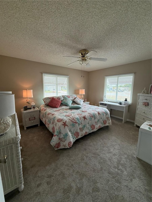 17569 SE 107th Ct, Summerfield, FL 34491 - bedroom featuring carpet floors, a textured ceiling, and ceiling fan