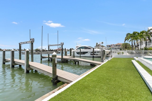 905 Bay Point Dr, Madeira Beach, FL 33708 - dock featuring boat lift and a water view