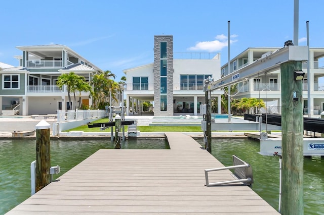 905 Bay Point Dr, Madeira Beach, FL 33708 - dock area featuring a water view