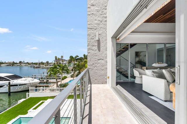 905 Bay Point Dr, Madeira Beach, FL 33708 - balcony featuring a water view