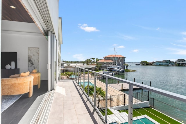 905 Bay Point Dr, Madeira Beach, FL 33708 - balcony featuring a water view and view of pool