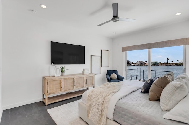 905 Bay Point Dr, Madeira Beach, FL 33708 - bedroom with recessed lighting, dark tile patterned flooring, and a ceiling fan