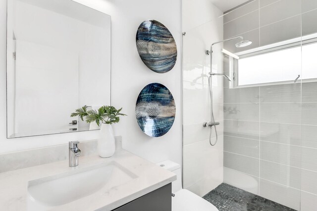 905 Bay Point Dr, Madeira Beach, FL 33708 - full bath featuring vanity and a tile shower