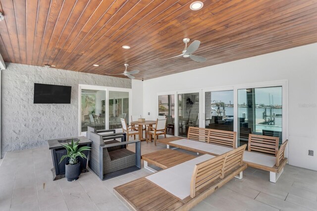 905 Bay Point Dr, Madeira Beach, FL 33708 - view of patio / terrace with a ceiling fan, outdoor lounge area, and outdoor dining area