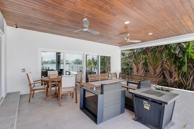 905 Bay Point Dr, Madeira Beach, FL 33708 - view of patio / terrace featuring outdoor dining space and a ceiling fan