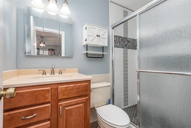 89 Fremont Ave Unit 504, Daytona Beach, FL 32114 - full bath featuring a shower stall, vanity, and ceiling fan