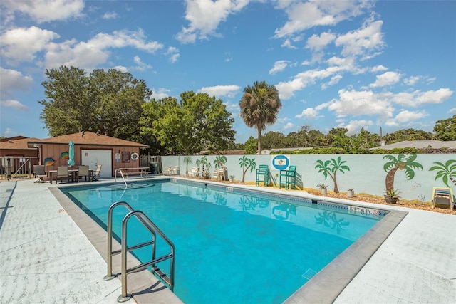 89 Fremont Ave Unit 504, Daytona Beach, FL 32114 - view of swimming pool with a fenced backyard and a patio area
