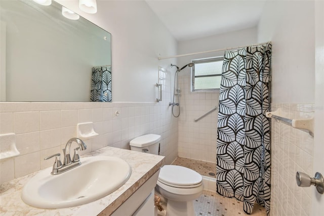 2310 Denmark St Unit 34, Clearwater, FL 33763 - full bathroom with tile walls, a stall shower, vanity, and wainscoting