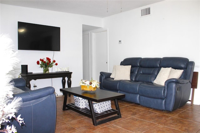 5 Moonlight Ln, Winter Haven, FL 33884 - living room with dark tile patterned flooring