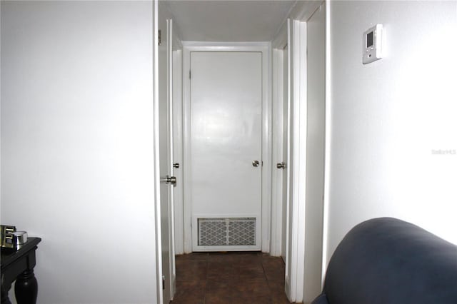 5 Moonlight Ln, Winter Haven, FL 33884 - hallway with dark tile patterned flooring