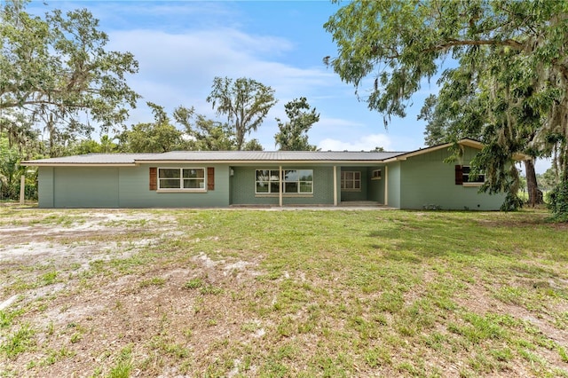 9819 Allen Rd, Lithia, FL 33547 - rear view of property with a yard