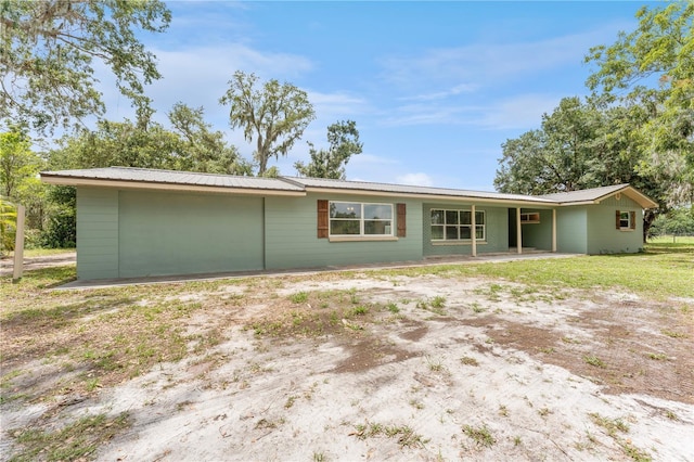 9819 Allen Rd, Lithia, FL 33547 - back of property with a metal roof