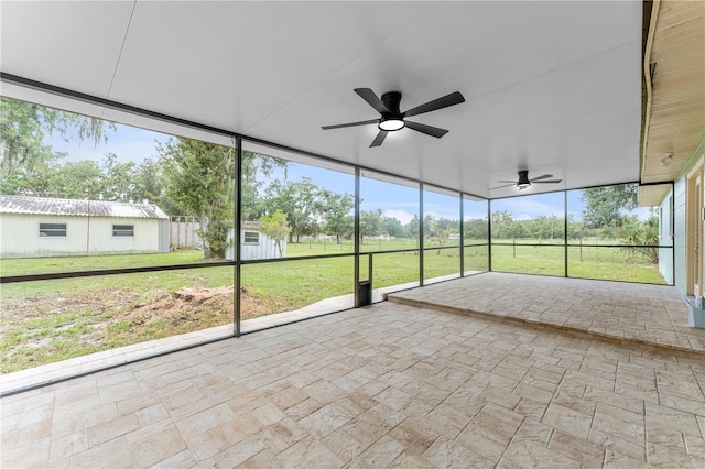 9819 Allen Rd, Lithia, FL 33547 - unfurnished sunroom with ceiling fan and plenty of natural light