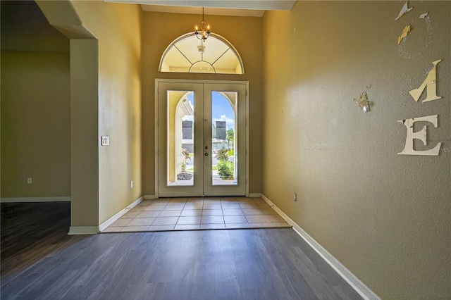1835 Fircrest Ct, Wesley Chapel, FL 33543 - entrance foyer with french doors and wood finished floors