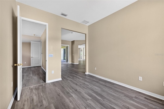 1835 Fircrest Ct, Wesley Chapel, FL 33543 - spare room featuring dark wood finished floors and baseboards