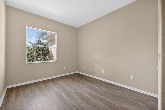 1835 Fircrest Ct, Wesley Chapel, FL 33543 - spare room with wood finished floors and baseboards