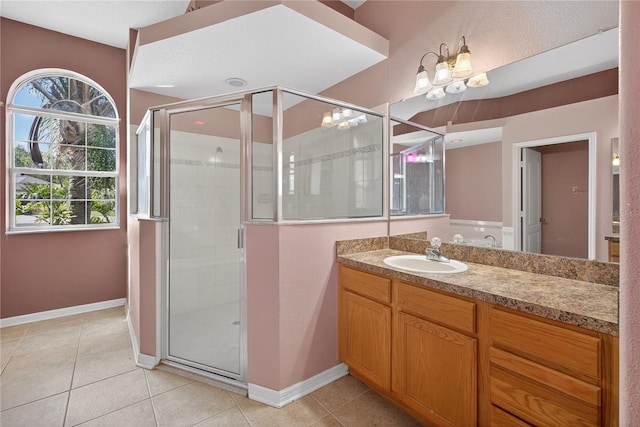 1835 Fircrest Ct, Wesley Chapel, FL 33543 - full bath with vanity, a stall shower, tile patterned flooring, and a chandelier