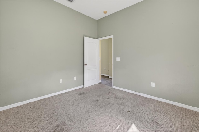 1835 Fircrest Ct, Wesley Chapel, FL 33543 - carpeted spare room featuring baseboards and a smoke detector