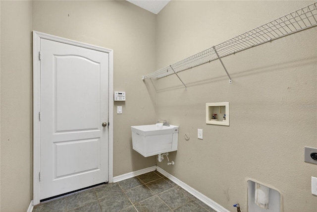 1835 Fircrest Ct, Wesley Chapel, FL 33543 - laundry area featuring gas dryer hookup, hookup for a washing machine, hookup for an electric dryer, and dark tile patterned flooring