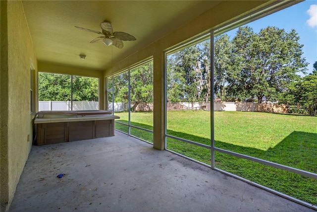 1835 Fircrest Ct, Wesley Chapel, FL 33543 - unfurnished sunroom with a hot tub, ceiling fan, and plenty of natural light