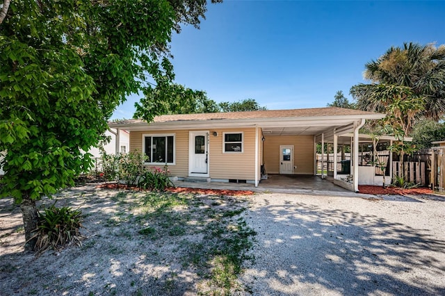 8184 49th Ave N, Saint Petersburg, FL 33709 - ranch-style home featuring driveway and an attached carport
