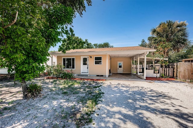 8184 49th Ave N, Saint Petersburg, FL 33709 - ranch-style home featuring driveway and a carport