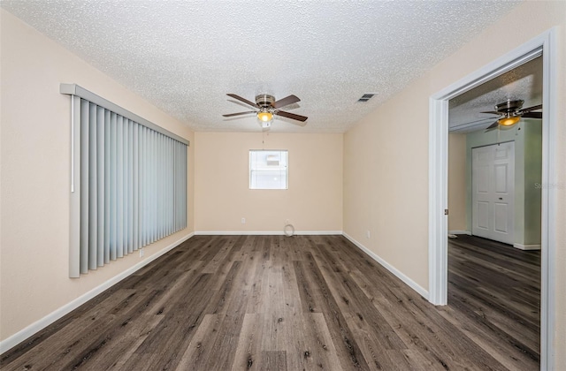 8184 49th Ave N, Saint Petersburg, FL 33709 - spare room with a ceiling fan, wood finished floors, and a textured ceiling