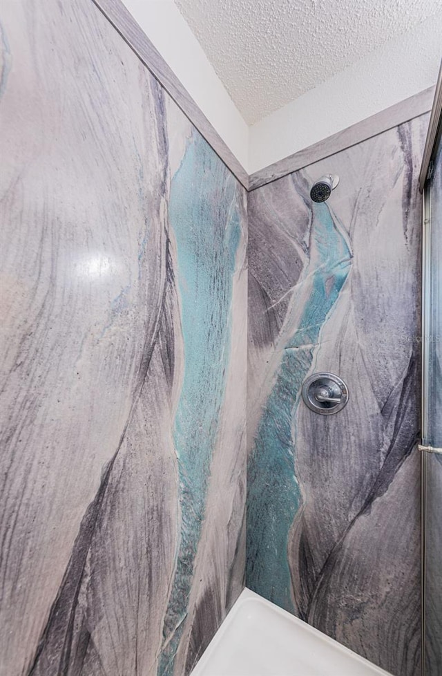 8184 49th Ave N, Saint Petersburg, FL 33709 - bathroom view of a marble finish shower