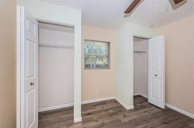 8184 49th Ave N, Saint Petersburg, FL 33709 - unfurnished bedroom with wood finished floors, a textured ceiling, and ceiling fan