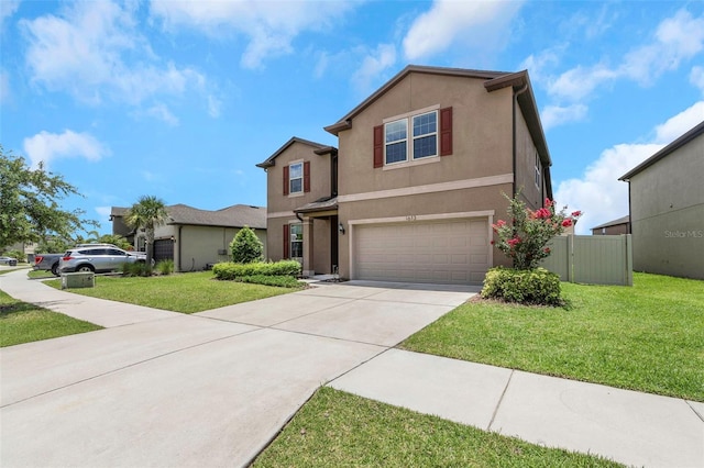 1613 Cabbage Key Dr, Ruskin, FL 33570 - traditional home with concrete driveway, an attached garage, and stucco siding